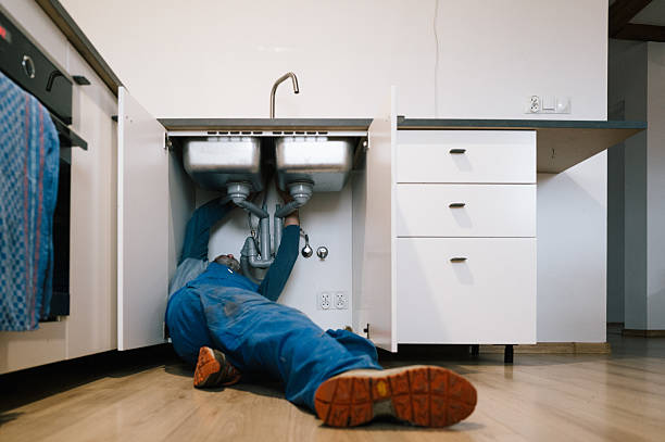 Professional Emergency Plumber technician working in Camillus, NY